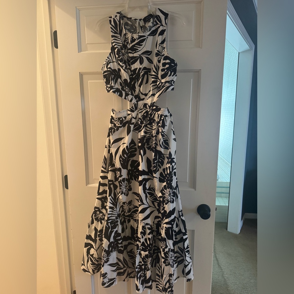 NWOT - black and white floral maxi dress with side cutouts. Size XL